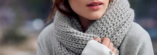 Woman wearing grey scarf