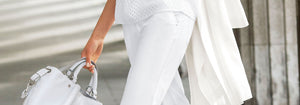 Woman wearing white trousers