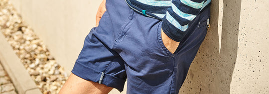 Man wearing blue shorts
