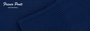 Close image of a blue knit jumper