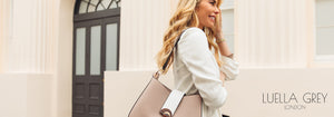 Woman wearing Luella Grey handbag