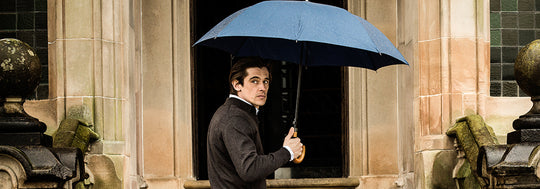 Man holding an umbrella