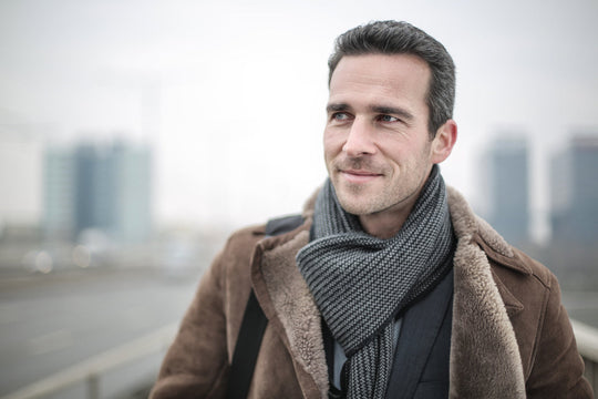 Man wearing grey scarf